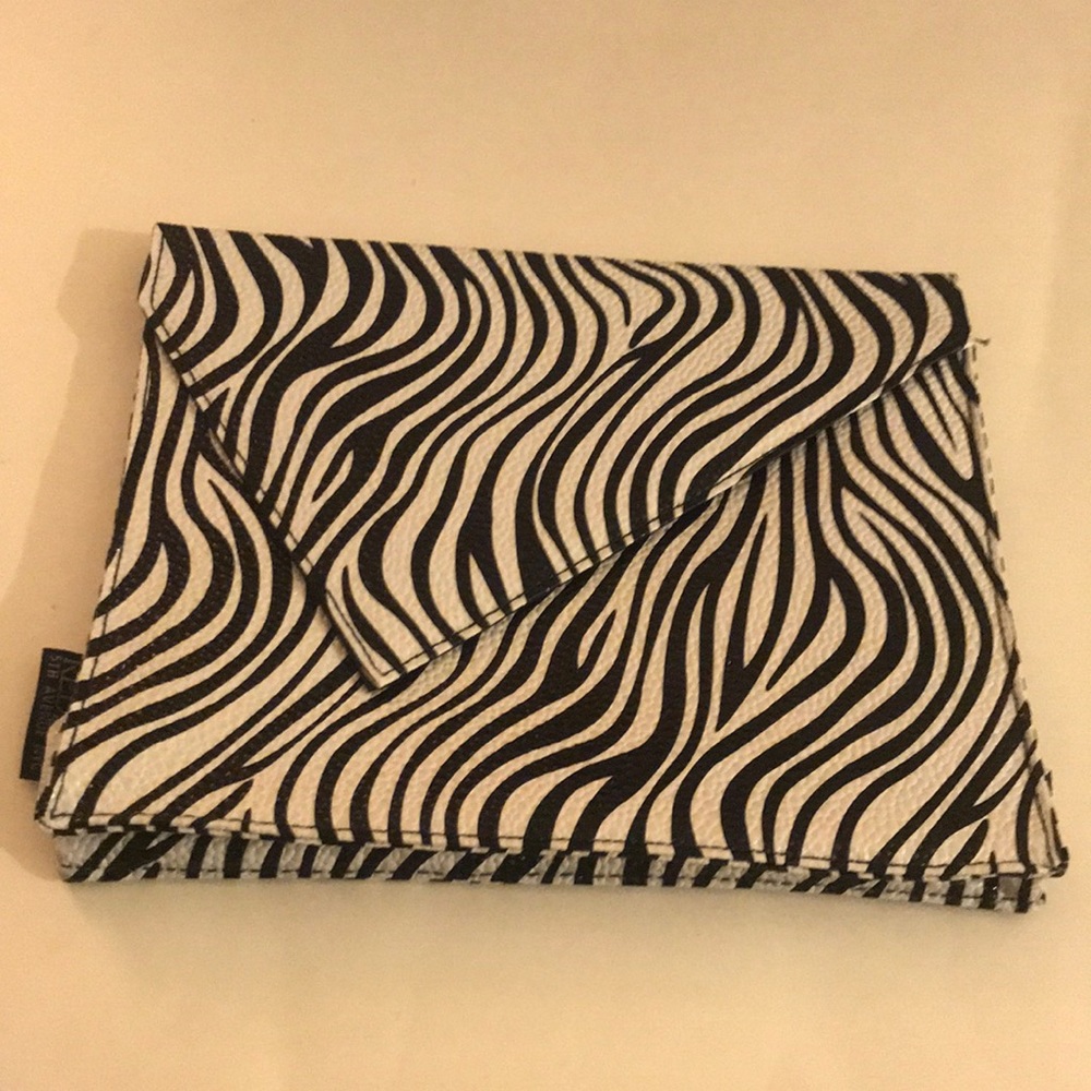 Redken 5th Avenue NYC Clutch